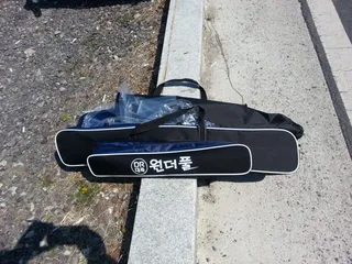 일체형 받침틀 개봉기 ....